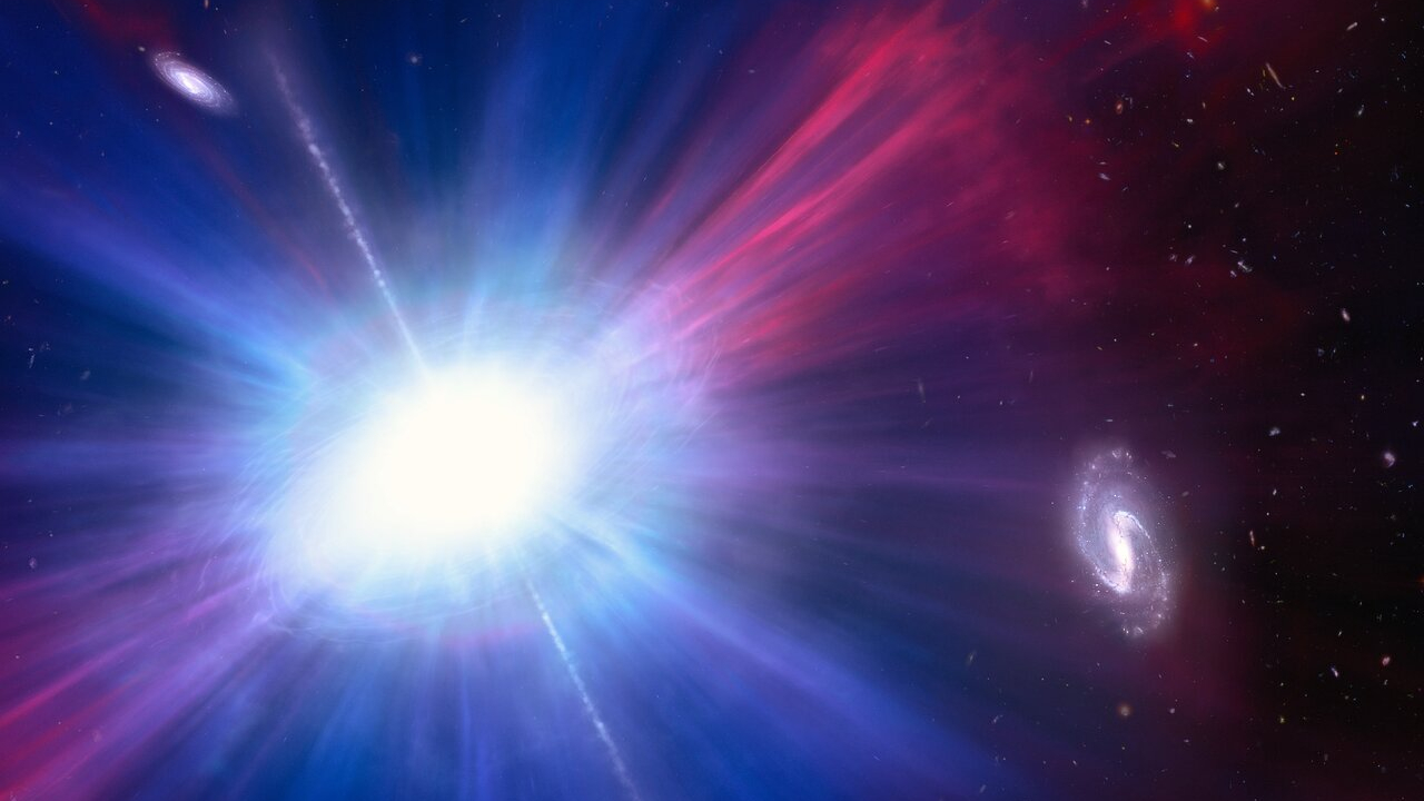 A bright flash of purple and blue light in space is illustrated in this image.
