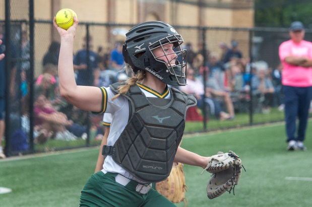 The catcher throws to first base during Amherst vs. Twinsburg softball, May 27, 2026. (Aimee Bielozer - For The Morning Journal)