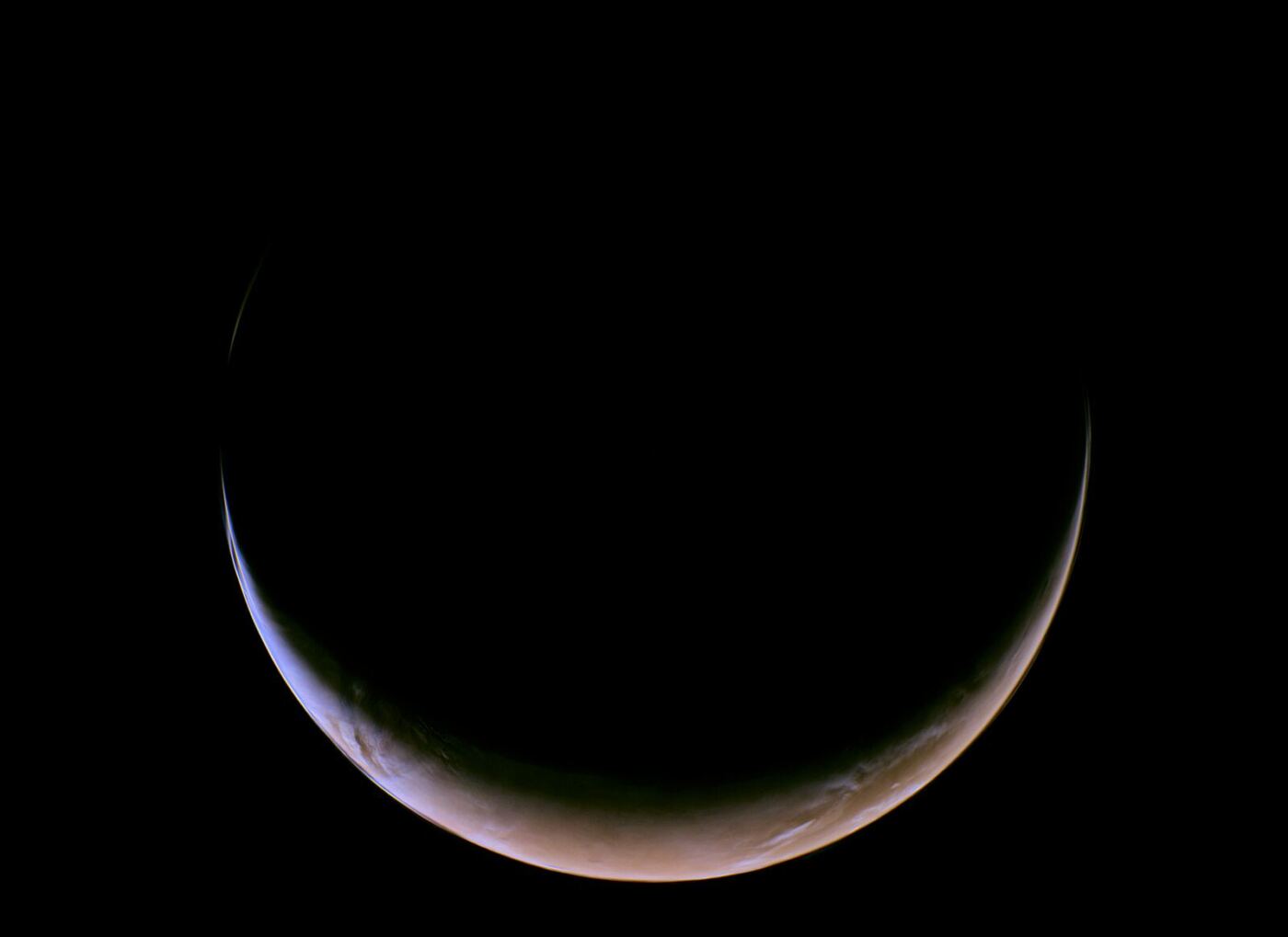 This view of a crescent Mars was captured on May 15, 2026 by NASA’s Psyche mission as it approached the planet for a gravity assist. NASA/JPL-Caltech/ASU