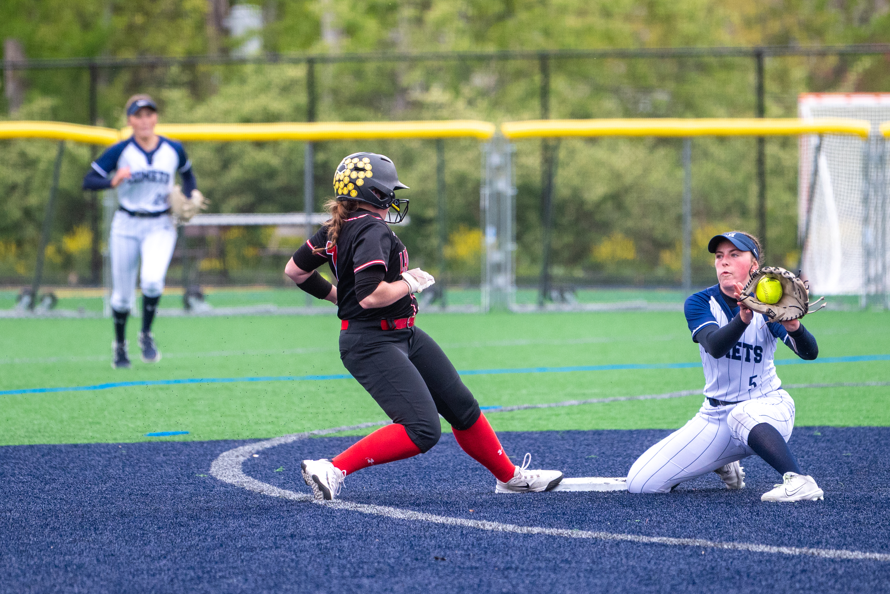 Abington Heights’ Eva Kane attempts to get North Pocono’s Amelia...