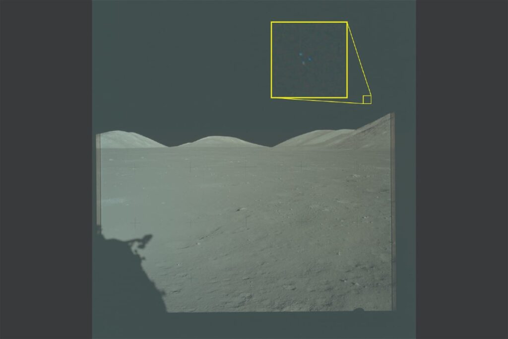 The Pentagon on Friday released an archival image from the Apollo 17 mission to the Moon. The yellow box contains an enlarged area of the original photo in which three lights are visible above the lunar terrain.