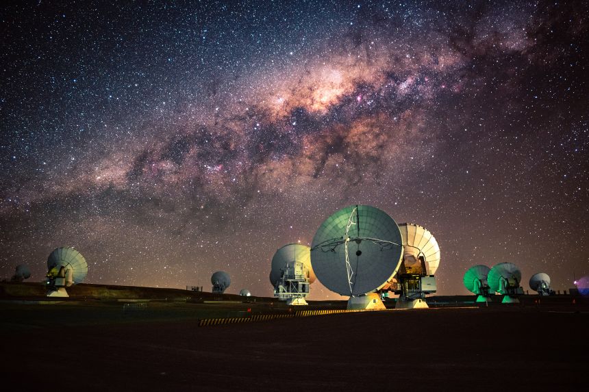 The Milky Way can be seen above the ALMA radio telescope array in Chile.
