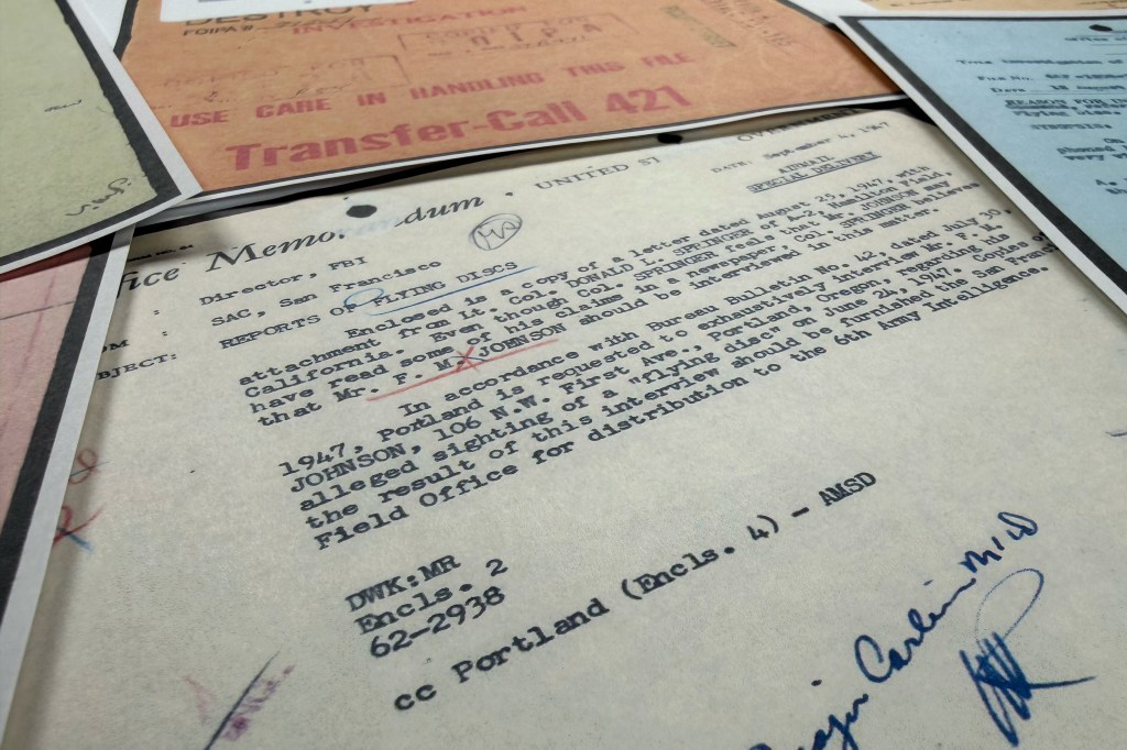 A close-up of a declassified FBI memo regarding reports of flying discs.