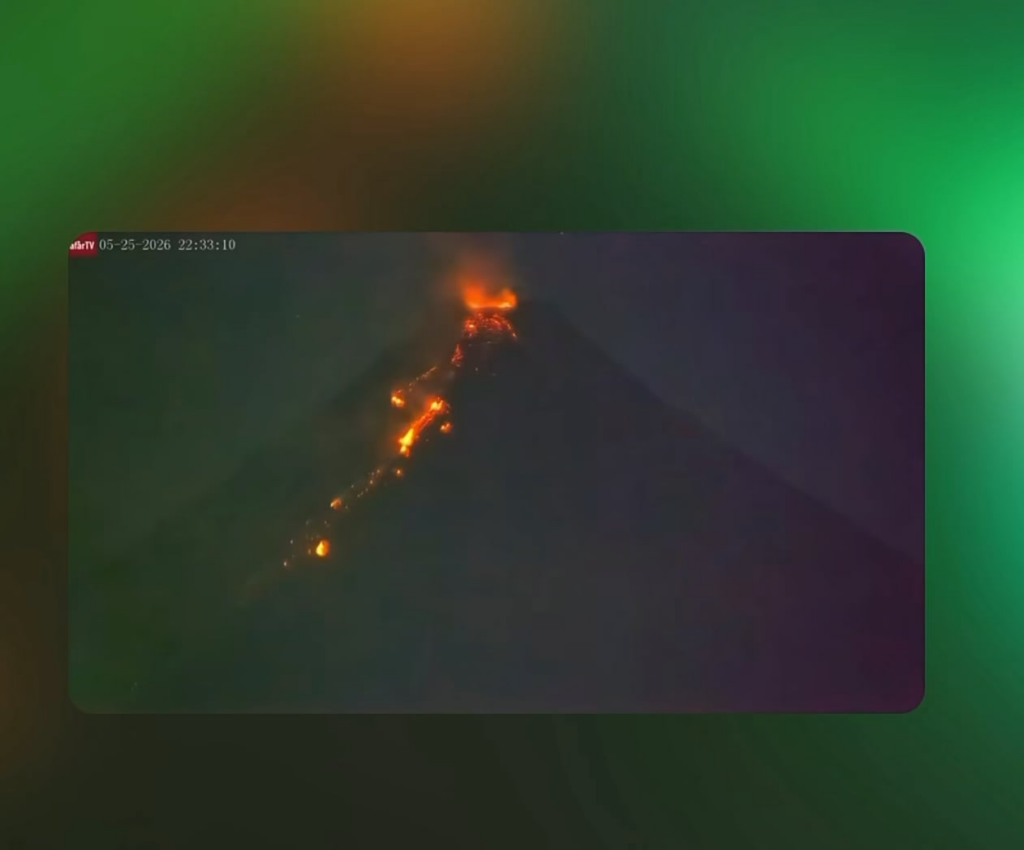 Meteor crashes behind erupting Mayon volcano in the Philippines, then footage captures something flying upward…