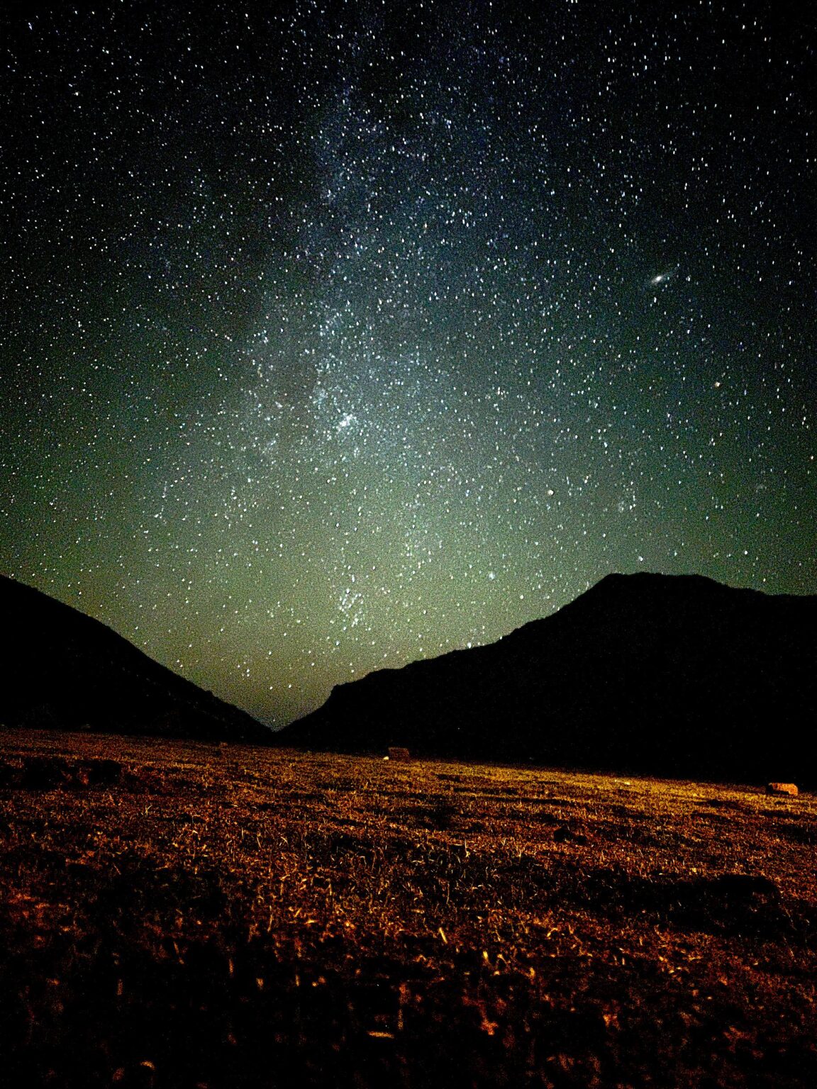 Milky way and Andromeda galaxy (adjacent to each other)captured from my phone.