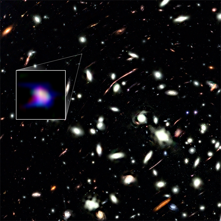 Astronomers Observe the Most Chemically Primitive Galaxy in the Early Universe An image of the massive galaxy cluster MACS J0416 with a three-color composite image of LAP1-B in "velocity space" (inset). Credit: NASA/ESA/CSA/K. Nakajima et al. (2026)