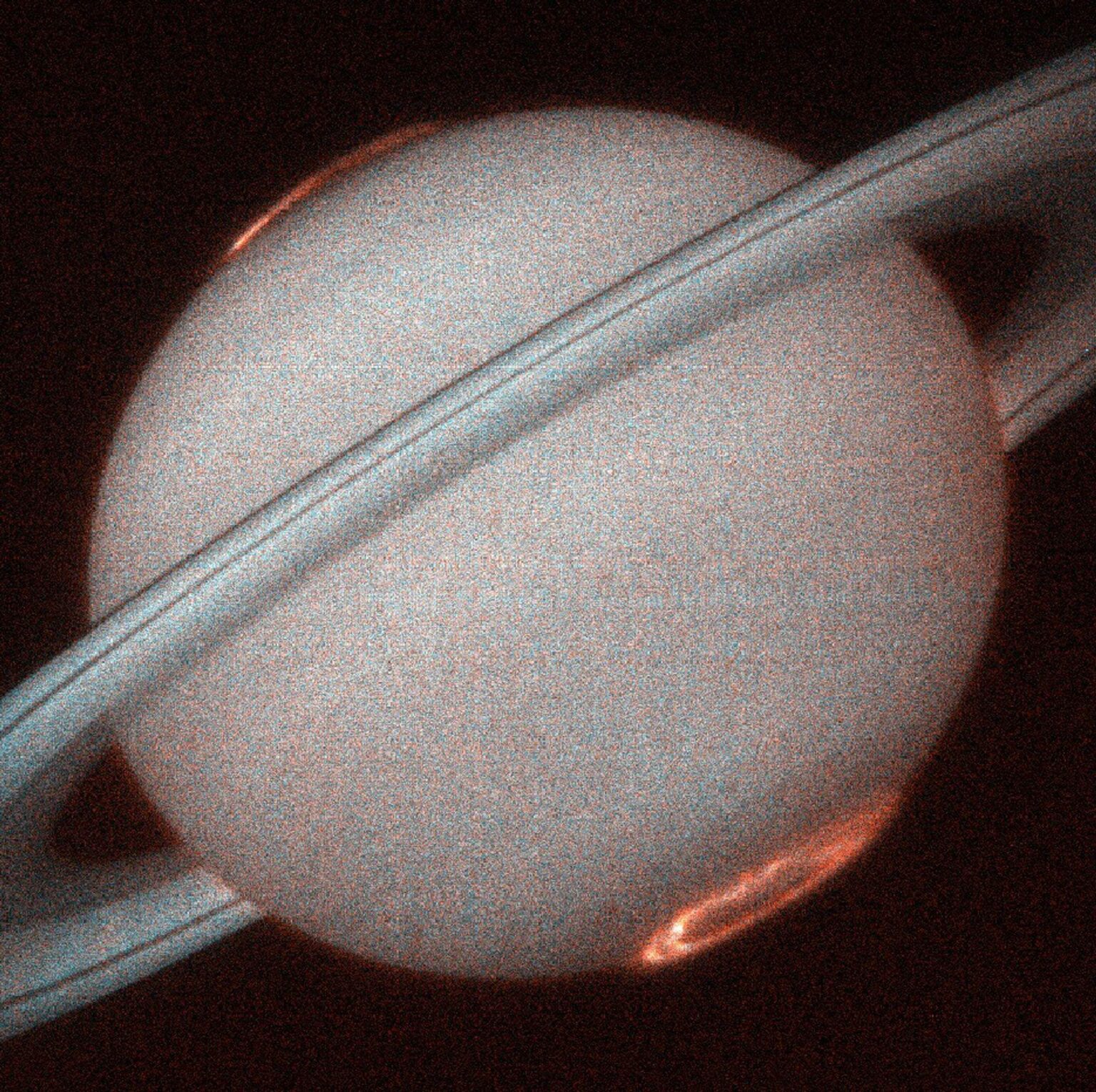If you could see in the UV, and looked at Saturn, its aurorae would look like this. This is the first image of Saturn's ultraviolet aurora taken by Hubble in October 1997, when Saturn was at a distance of 1.3 billion km from Earth.