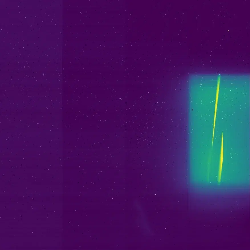 A test calibration image from the NIRDA instrument. The inset shows the dispersal of light into vertical lines. Credit: LLNL.