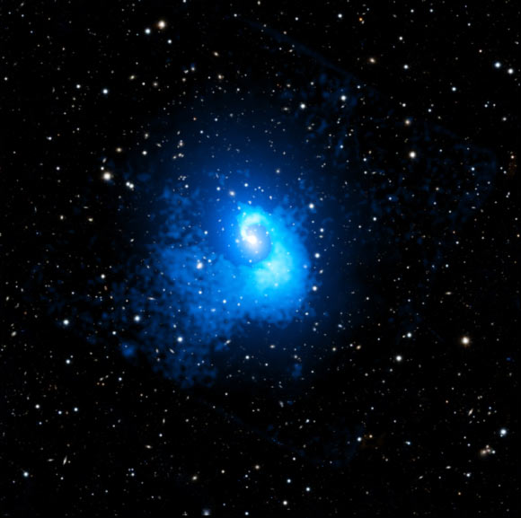 This composite image combines both the original X-ray and the subtracted X-ray images of the deep Chandra observations of Abell 2029. Image credit: NASA / CXC / CfA / Watson et al. / PanSTARRS / SAO / N. Wolk / P. Edmonds.