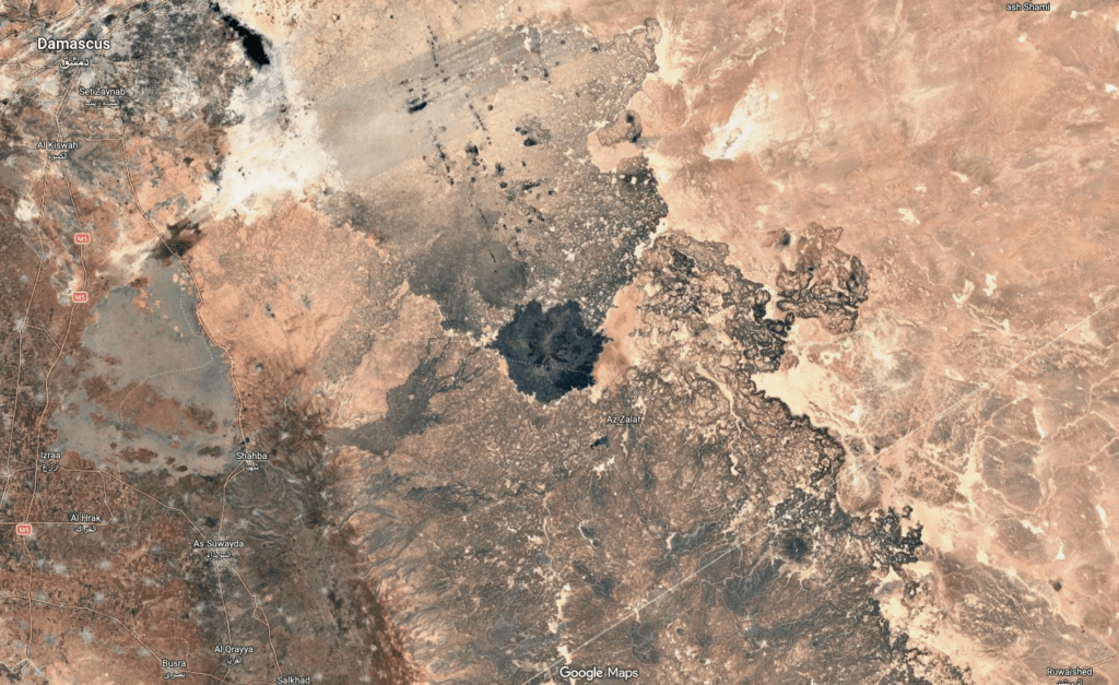 TIL: About the Es Safa Volcanic Field in Syria, dated to 11,700 years ago. Note the lava field and various eruptions north of the largest visible volcano.