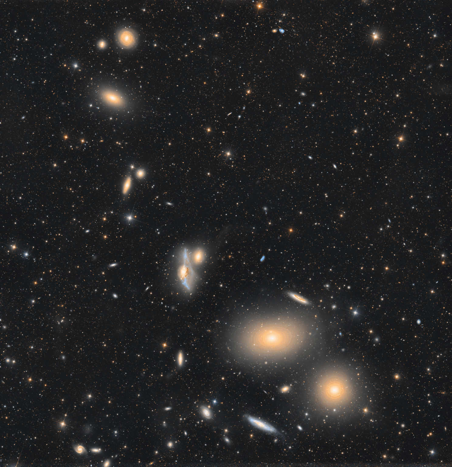 A string of galaxies known as Markarian's Chain stretches across the heart of the Virgo Galaxy Cluster