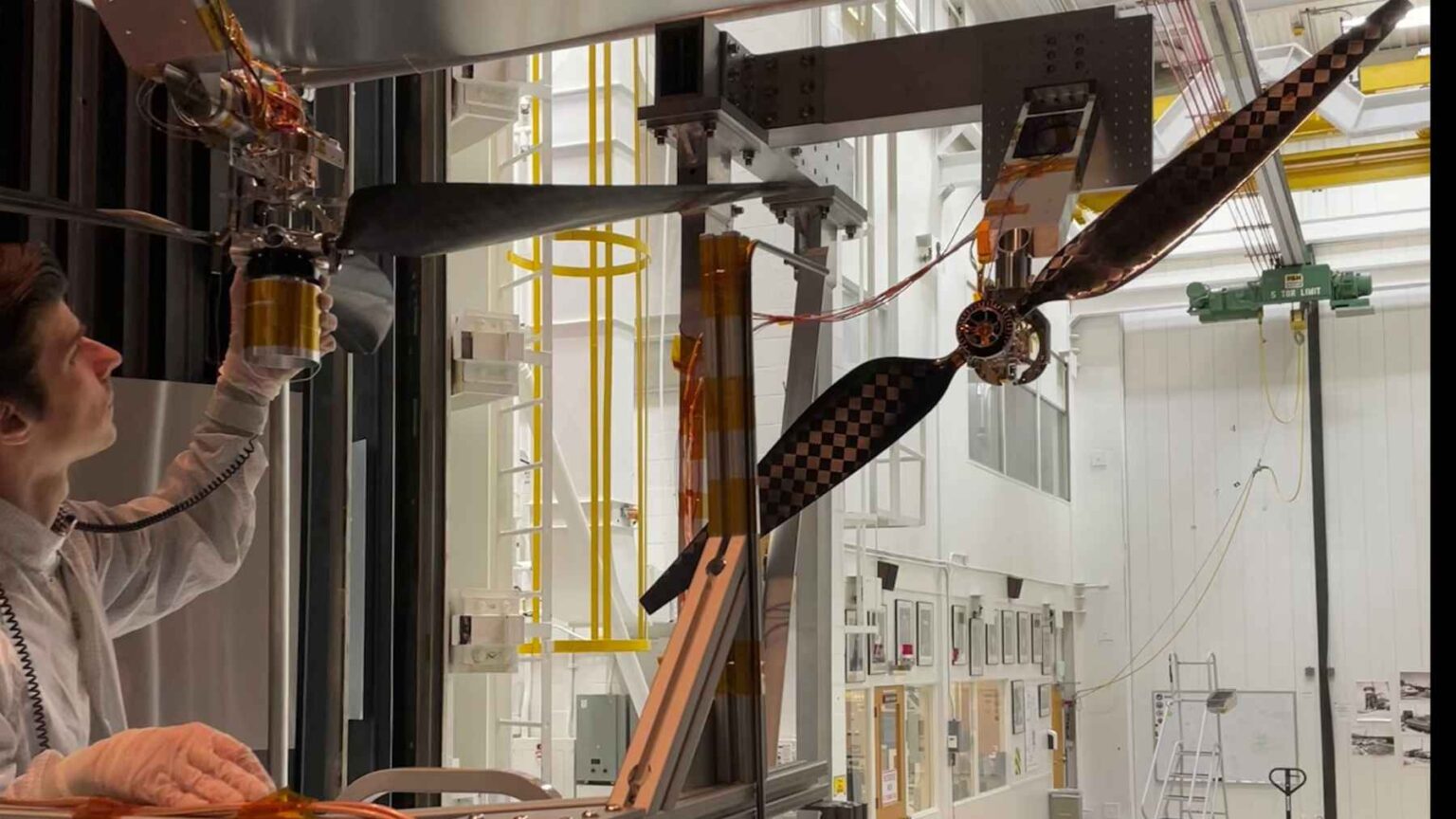NASA engineers build a supersonic rotor for Mars, and carbon-fiber blades at JPL are already nearing Mach 1.08 in tests that push off-world flight to the edge NASA engineer testing next-generation Mars helicopter rotor blades inside a JPL laboratory chamber.
