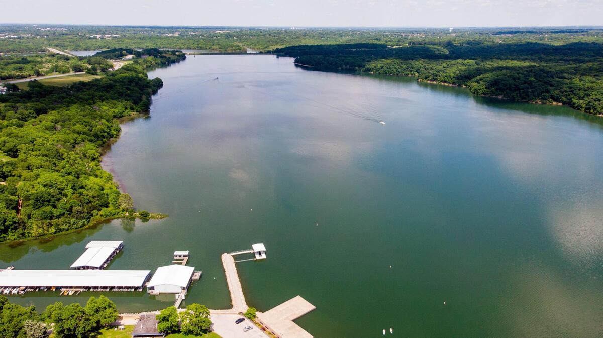People have reported sightings of UFOS going in and out of the water at Lake Jacomo near Blue Springs.