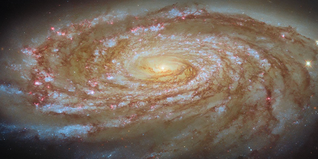 NASA’s Hubble telescope captures image of an active spiral galaxy on a journey NASA’s Hubble telescope captures image of an active spiral galaxy on a journey