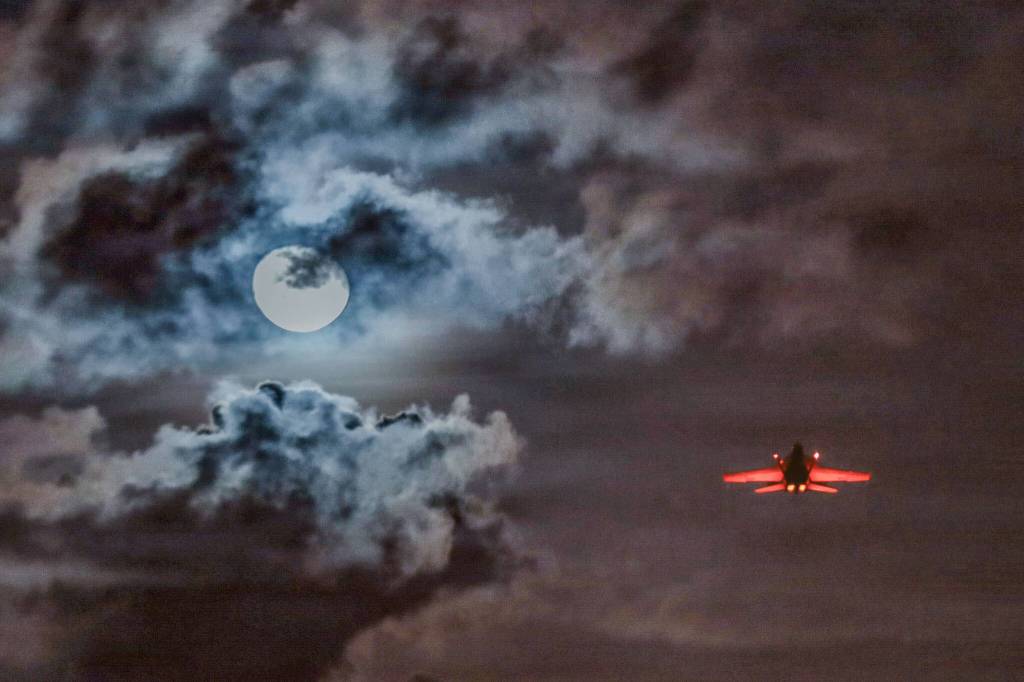 Close encounters of the Whidbey kind U.S. Navy photo by Seaman Apprentice Leo Friedlein. Some skeptics suggest that military aircraft, like this EA-18G Growler, may be mistaken for UFOs, especially when the lighting or weather is unusual.