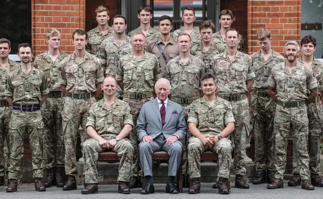 Charles on a visit to 1st Battalion Grenadier Guards at Lille Barracks in Aldershot, ahead of their participation in Trooping the Colour