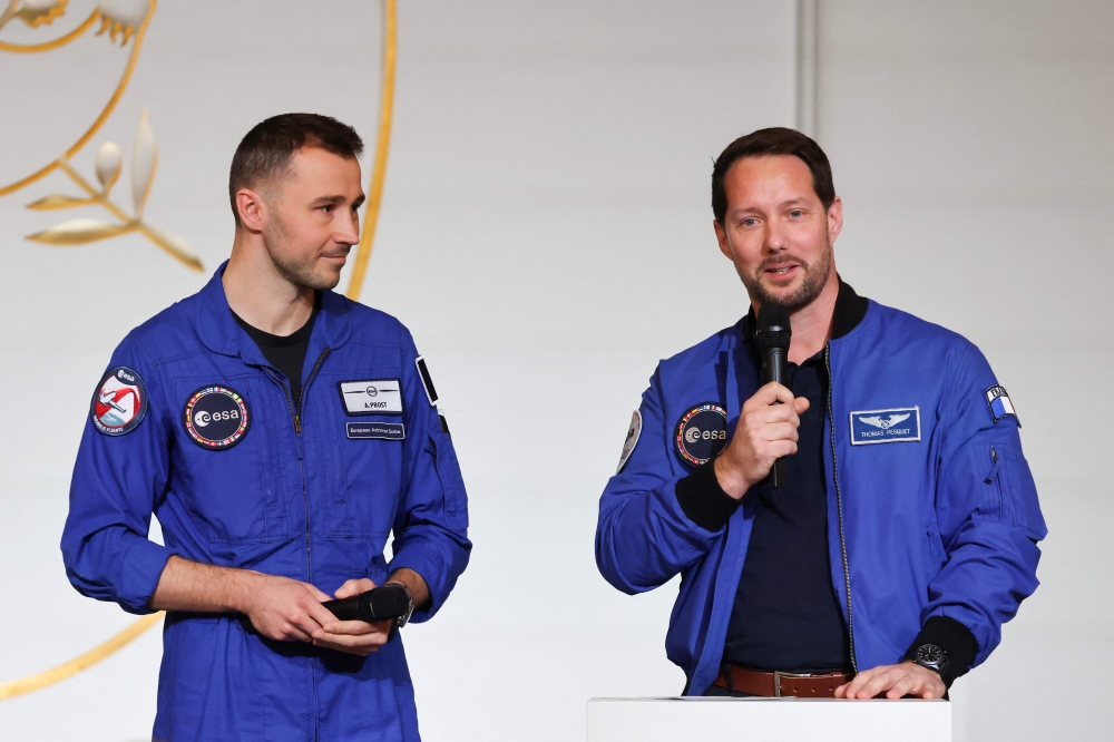 French astronaut to fly to commercial space station under deal (Files) ESA (European Space Agency) French astronaut Thomas Pesquet (R) next to French astronaut Arnaud Prost addresses the audience at the presidential Elysee Palace in Paris on February 5, 2026. (Photo by Ludovic Marin / Pool / AFP)