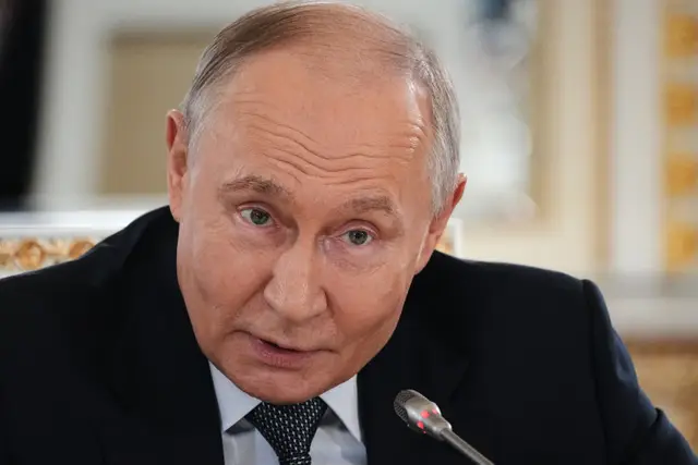 Russian President Vladimir Putin speaks during a meeting with representatives of international news agencies on the sidelines of the St. Petersburg International Economic Forum at the Constantine Palace in St. Petersburg, Russia