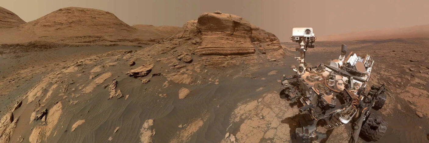This self-portrait of NASA’s Curiosity Mars rover shows the vehicle at the ‘Quela’ drilling location in the ‘Murray Buttes’ area on lower Mount Sharp. The scene combines approximately 60 images taken by the Mars Hand Lens Imager (MAHLI) camera at the end of the rover’s robotic arm. Most of the component images were taken in September 2016.