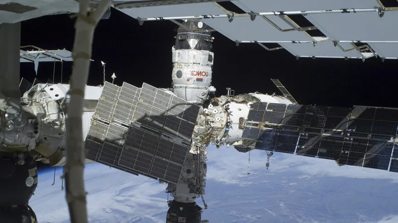 The Russian side of the International Space Station, including the Zvezda module and PrK tunnel