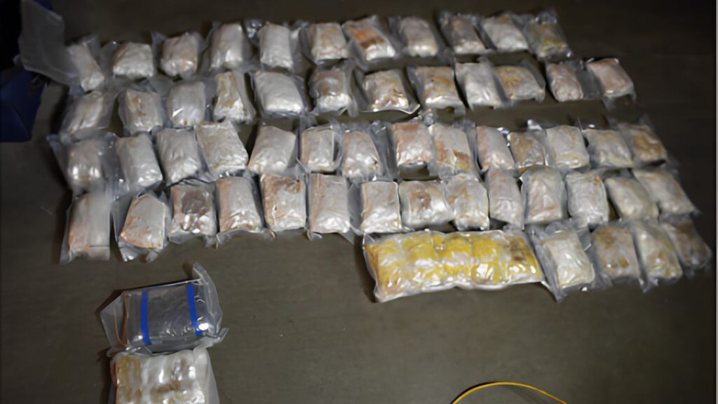 Illegal alien gets 15 years for plot to kill Washington cop Bags of methamphetamine, fentanyl pills, and heroin seized by federal agents in the Iris Amador-Gar...